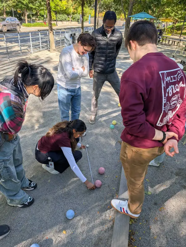 Lab members playing lawn games